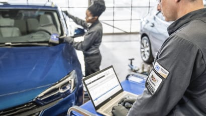 GM technicians working in a garage